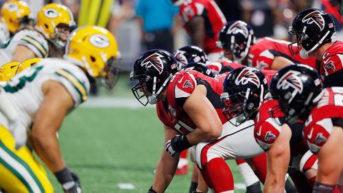 Falcons center  Alex Mack #51 prepares to snap the ball during the second half against the Packers at Mercedes-Benz Stadium on September 17,  in Atlanta