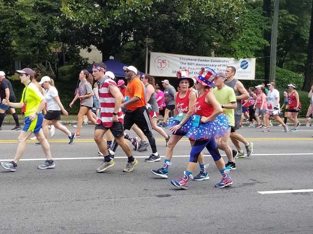 See the most interesting costumes from the 50th running AJC Peachtree Road Race