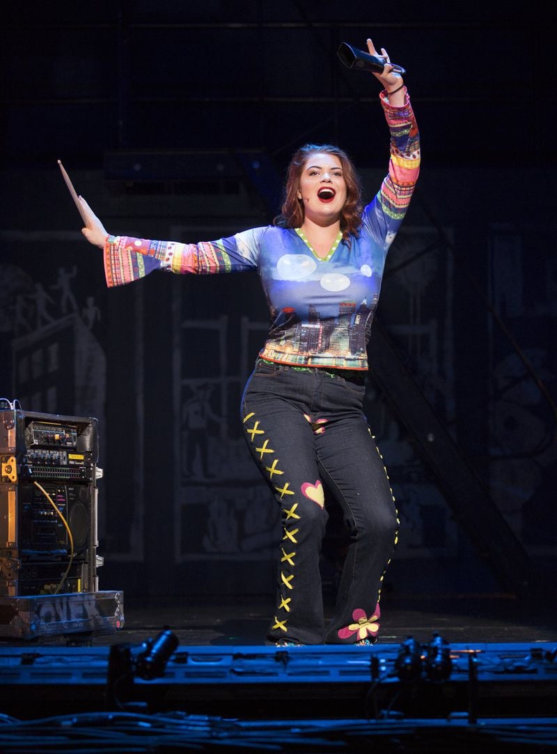  Lyndie Moe plays the role of "Maureen," originated by Idina Menzel on Broadway, in "Rent." Photo: Carol Rosegg