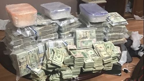Four hundred pounds of methamphetamine, 175 pounds of cocaine, $2 million in cash and 10 firearms were seized in a DEA operation that resulted in 35 arrests, including 10 Gwinnett County residents.