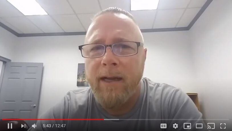 Chris Hill, leader of the Georgia Security Force III% militia, in a YouTube video recorded Thursday, Oct. 8, 2020, talked to his followers about the arrests of 13 men in an alleged plot to kidnap the governor of Michigan, Gretchen Whitmer.