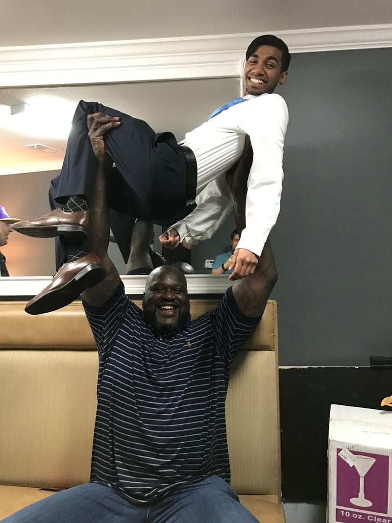 , who contributes funny bits to the podcast, flew down from New York City to meet his hero Shaq and get uplifted by him... literally. (The 23-year-old IT guy said he's maybe 100 pounds wet.). CREDIT: Rodney Ho/rho@ajc.com