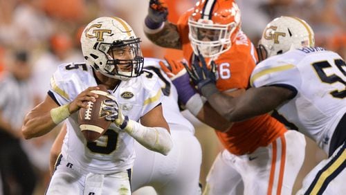 September 22, 2016 Atlanta - Georgia Tech Yellow Jackets quarterback Justin Thomas (5) looks for a space for a pass in the second half at Bobby Dodd Stadium on Thursday, September 22, 2016. Clemson Tigers won 26 - 7 over the Georgia Tech Yellow Jackets. HYOSUB SHIN / HSHIN@AJC.COM
