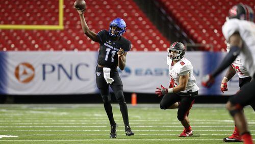 Georgia State quarterback Aaron Winchester (11) attempts a pass in the fourth quarter of their game against Ball State at the Georgia Dome, Friday, September, 2016, in Atlanta, Ga. PHOTO / JASON GETZ