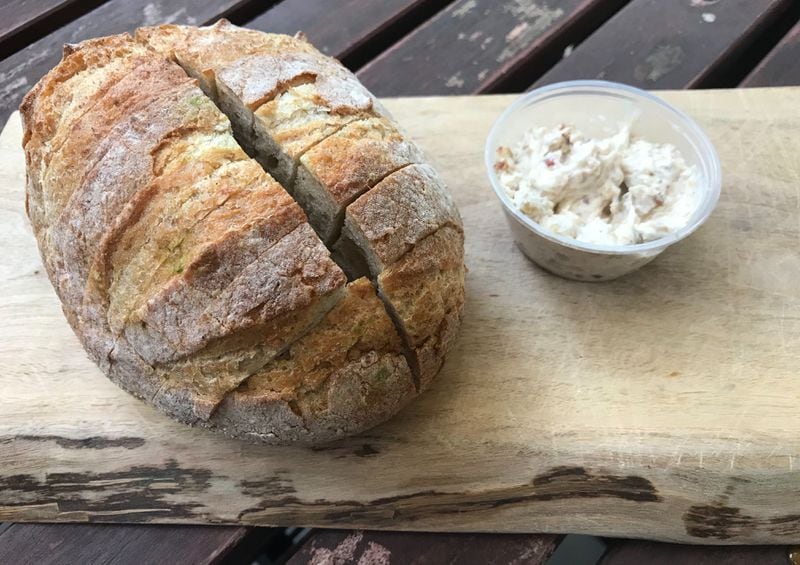 Sourdough bread, like this served at Paces & Vine, was one of the favored projects of many aspiring home bakers during the pandemic. Ligaya Figueras/ligaya.figueras@ajc.com