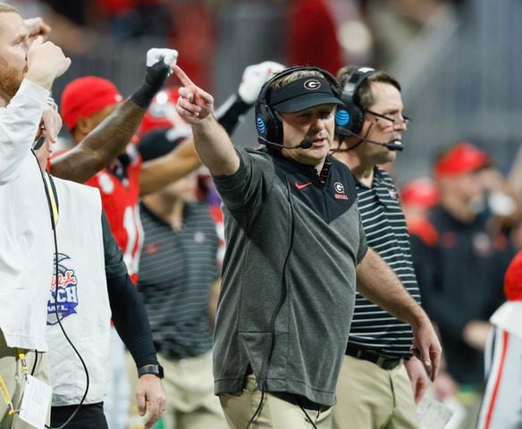 Georgia Bulldogs head coach Kirby Smart reacts to a to a third and one call during the second quarter of the College Football Playoff Semifinal between the Georgia Bulldogs and the Ohio State Buckeyes at the Chick-fil-A Peach Bowl In Atlanta on Saturday, Dec. 31, 2022. (Jason Getz / Jason.Getz@ajc.com)