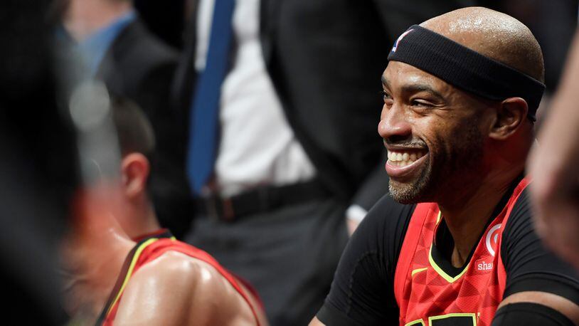 Vince Carter  of the Atlanta Hawks smiles during a timeout in during the second quarter of the game against the Brooklyn Nets at Barclays Center on January 9, 2019 in the Brooklyn borough of New York City.