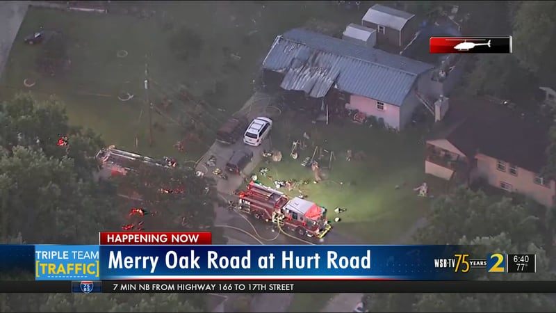 Cobb County fire crews battled a house fire on Merry Oak Road early Wednesday morning.