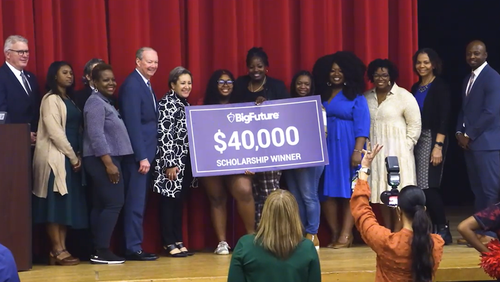 Hardaway High School senior E’lyssia Brown was awarded a $40,000 college scholarship in a surprise announcement Thursday. The stunned Brown collected herself after the ceremony and said, “It felt like winning a car from a game show.” (Photo Courtesy of Mike Haskey)