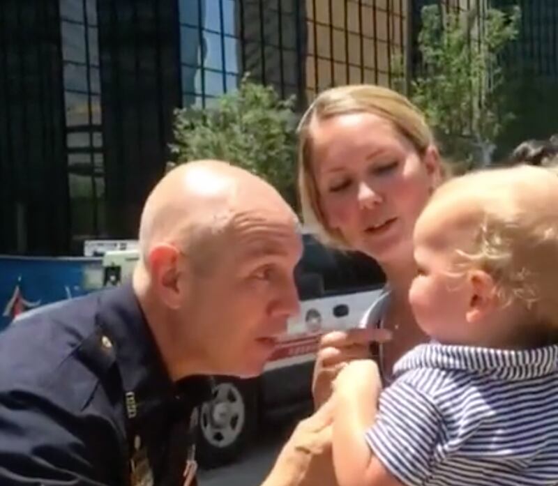A woman brought her baby to thank police officers in Dallas. Photo: Jennifer Brett