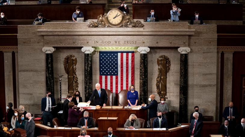 Vice President Mike Pence and House Speaker Nancy Pelosi preside over a joint session of Congress to certify the 2020 Electoral College results at the Capitol in Washington, Jan. 6, 2021.  (Erin Schaff/The New York Times)