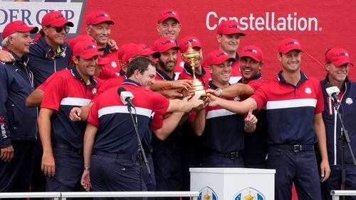 Team USA holds the trophy after the Ryder Cup matches at the Whistling Straits Golf Course Sunday, Sept. 26, 2021, in Sheboygan, Wis. (Charlie Neibergall/AP)
