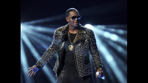 <p>
              In this June 30, 2013 file photo, R. Kelly performs at the BET Awards in Los Angeles. Kelly, one of the top-selling recording artists of all time, has been hounded for years by allegations of sexual misconduct involving women and underage girls _ accusations he and his attorneys have long denied. But an Illinois prosecutor’s plea for potential victims and witnesses to come forward has sparked hope among some advocates that the R&B star might face new charges. (Photo by Frank Micelotta/Invision/AP, File)
            </p>