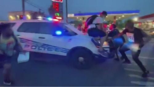 A Detroit Police Department SUV plowed into a crowd of protesters who surrounded the cruiser and refused to move Sunday night, launching two people off the hood and hurling several others to the ground before speeding away, according to reports, citing video footage of the incident. There were no serious injuries, although some needed treatment at local hospitals, according to reports.