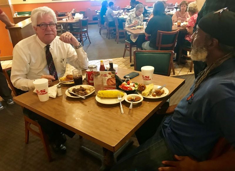 S&S Cafeteria manager James Burley (left) sits down for lunch with Randy Harper (right). Harper as been a maintenance worker at the restaurant since 1997. Harper, also a preacher, presided over Burley's wedding ceremony. Credit: Ligaya Figueras