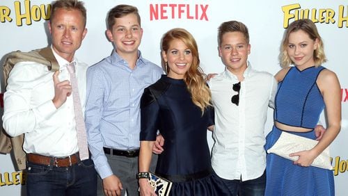 LOS ANGELES, CA - FEBRUARY 16: (L-R) Professional hockey player Valeri Bure, Lev Valerievich Bure, actress Candace Cameron Bure, Maksim Valerievich Bure, and Natasha Valerievna Bure attend the premiere of Netflix's 'Fuller House' at Pacific Theatres at The Grove on February 16, 2016 in Los Angeles, California. Candace Cameron Bure, her husband Valeri Bure and their sons (all pictured) watched daughter Natasha audtiton for NBC's "The Voice," which aired Oct. 4. (Photo by Frederick M. Brown/Getty Images)