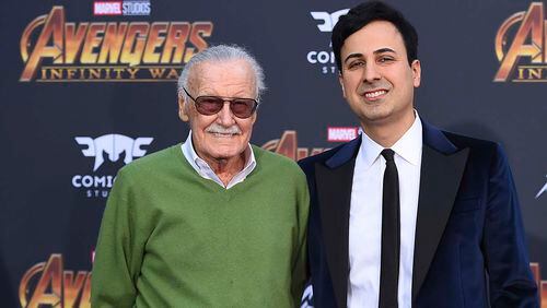 In this April 23, 2018, file photo, Stan Lee, left, and Keya Morgan arrive at the world premiere of 'Avengers: Infinity War' in Los Angeles. Morgan, the former business manager of Lee has been arrested on elder abuse charges involving the late comic book icon.