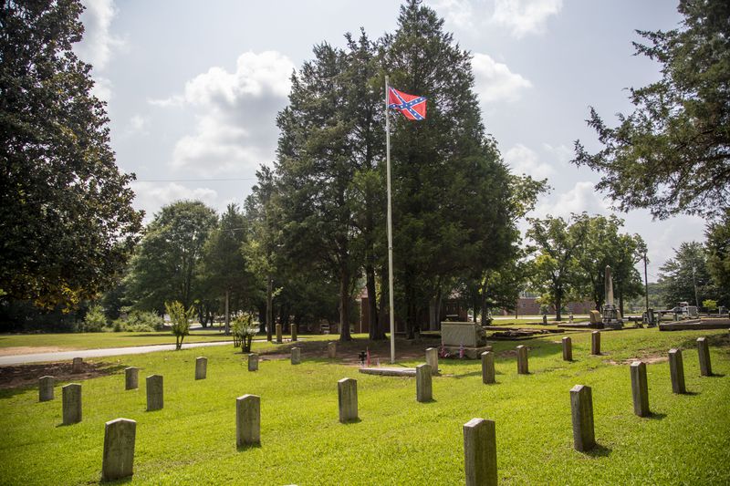 07/26/2021 — Newnan, Georgia —A Confederate flag is displayed at a Confederate States Army graveyard at the Oak Hill Cemetery in Newnan, Monday, July 26, 2021. (Alyssa Pointer/Atlanta Journal- Constitution)