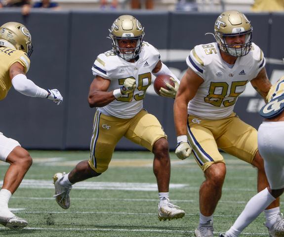 Englan Williams (39) finds running room for Team Swarm during Georgia Tech's spring football game in Atlanta on Saturday, April 15, 2023.   (Bob Andres for the Atlanta Journal Constitution)