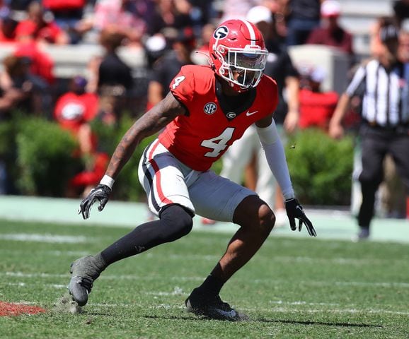 Georgia defensive back KJ Bolden works against the black team during the G-Day game.  Curtis Compton for the Atlanta Journal Constitution