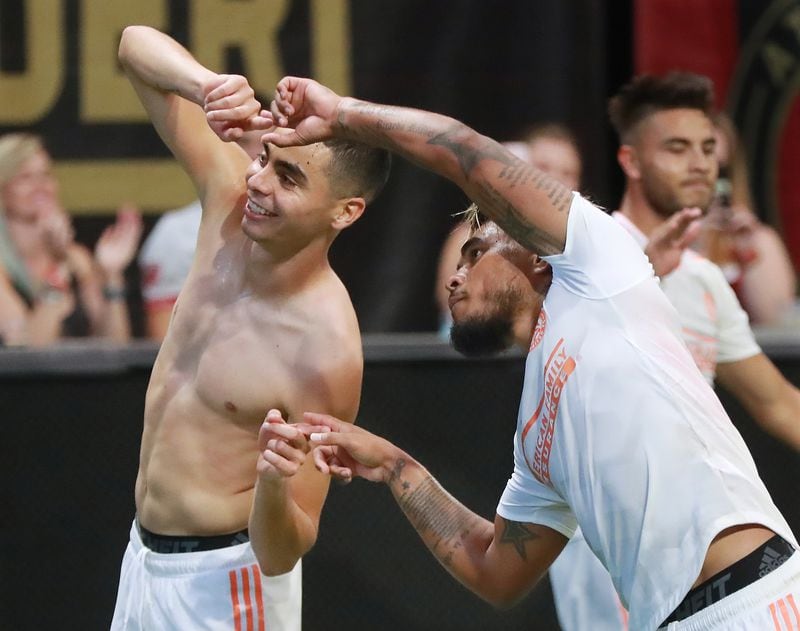 Back when: Atlanta United midfielder Miguel Almiron (left) celebrates his goal with Josef Martinez on Sunday, August 19, 2018, in Atlanta. File photo by Curtis Compton/ccompton@ajc.com