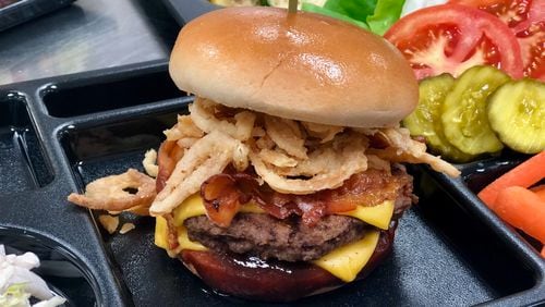 The Smokehouse gourmet burger served at Gwinnett schools features a whole-grain rich bun and condiments from local sources. These changes make the meals healthier but still palatable for students. COURTESY OF GWINNETT COUNTY PUBLIC SCHOOLS
