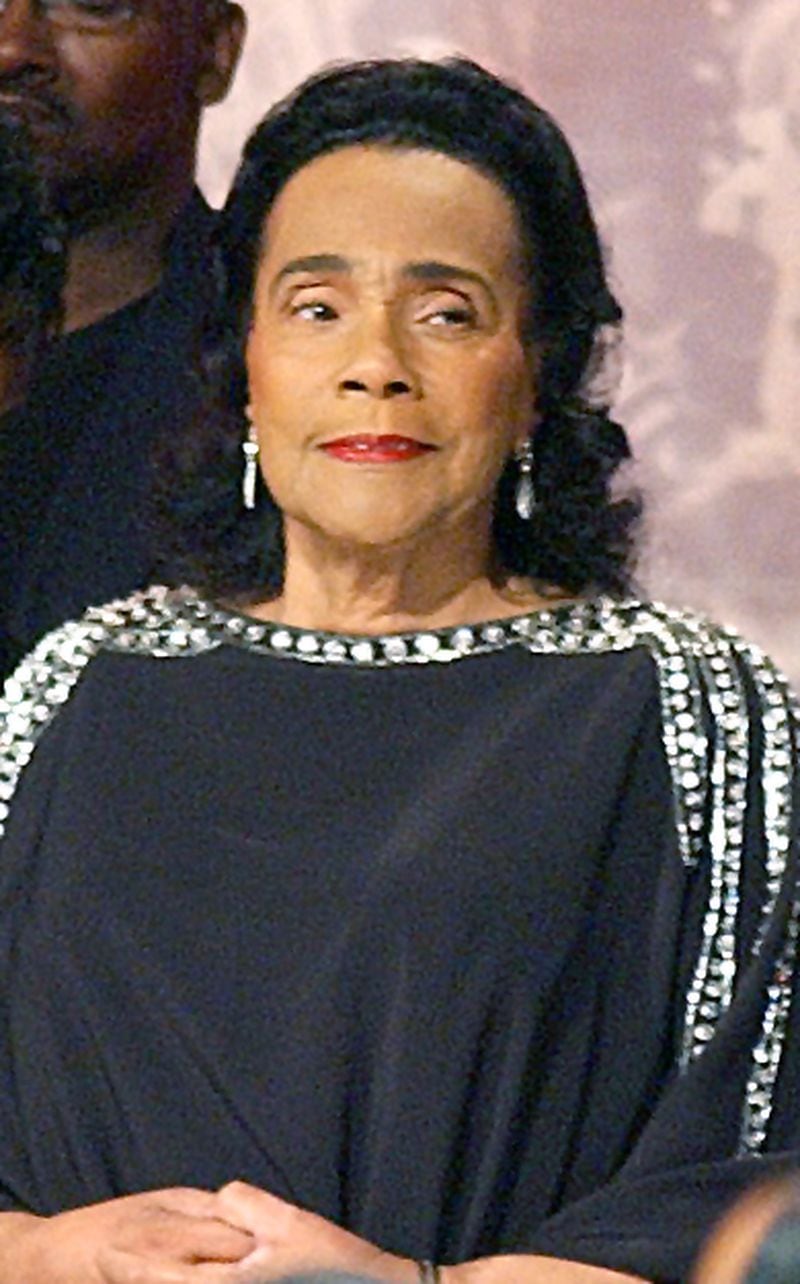 Coretta Scott King gets a standing ovation as she makes a surprise appearance at the Salute To Greatness Awards Dinner Saturday, Jan. 14, 2006. A stroke the previous August had rendered her unable to speak. It was her last public appearance before her death the next month. (W.A. BRIDGES JR/AJC staff)