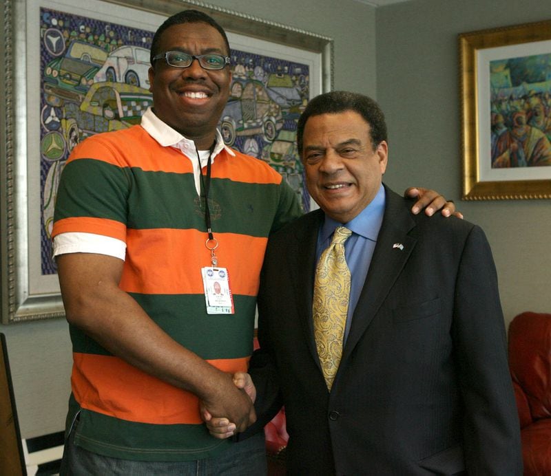 Atlanta Journal-Constitution reporter and author of “The Many Lives of Andrew Young” (NewSouth Books, $60), with Ambassador Andrew Young in 2012.