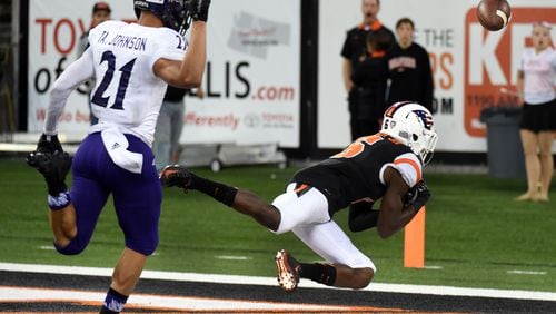 CORVALLIS, OR - SEPTEMBER 04: Wide receiver Victor Bolden #6 of the Oregon State Beavers can't hold onto a pass as cornerback Taron Johnson #21 of the Weber State Wildcats defends during the fourth quarter of the game at Reser Stadium on September 4, 2015 in Corvallis, Oregon.  (Photo by Steve Dykes/Getty Images)