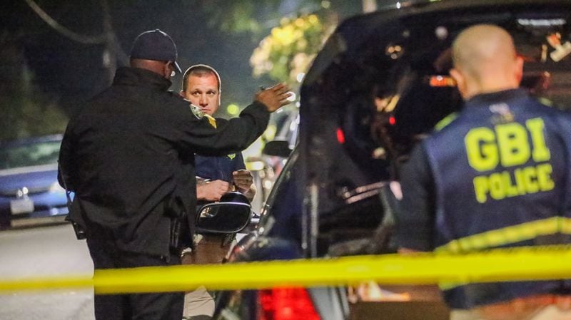 The Georgia Bureau of Investigation was on the scene of an officer-involved shooting in northwest Atlanta early Thursday. JOHN SPINK / JSPINK@AJC.COM