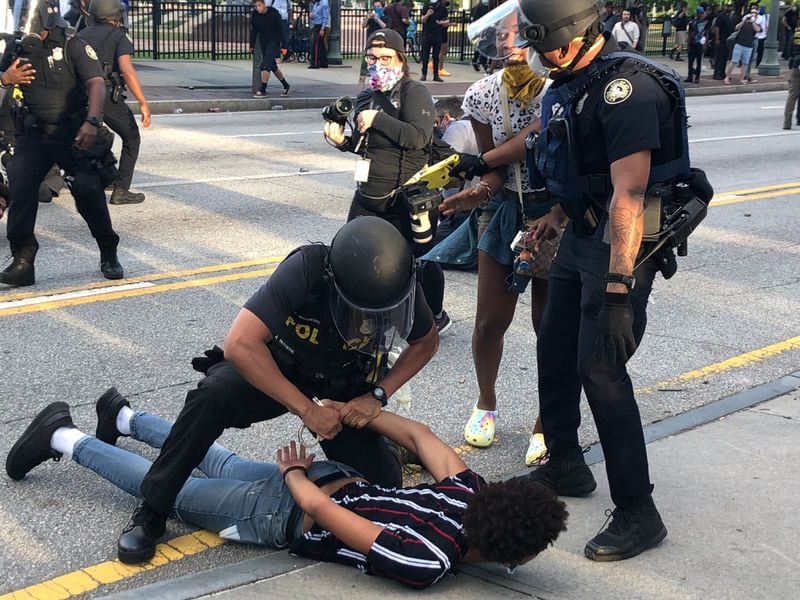 Demonstrators arrested for blocking streets in downtown Atlanta Saturday, May 30, 2020. DAVID WICKERT / AJC