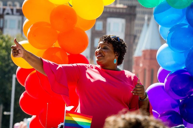Gubernatorial candidate Stacey Abrams gives a thumbs up to the crowd during Atlanta Pride Parade Sunday in Atlanta October 14, 2018. STEVE SCHAEFER / SPECIAL TO THE AJC