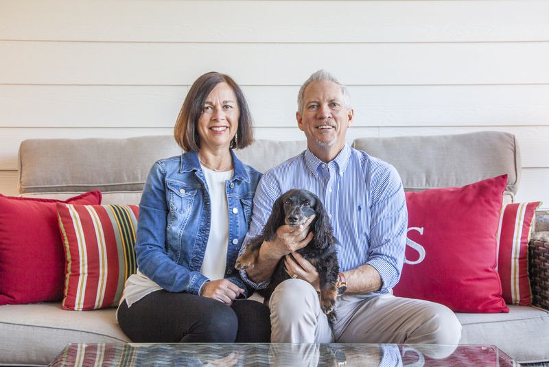 Mike and Renee Slaughter, along with their long-haired dachshund Mason, downsized to their new ranch home in 2018. Mike is director of discipleship at The Church of the Apostles and Renee is a real estate agent with Re/Max Unlimited. Text by Kat Khoury/Fast Copy News Service. Photo by Reann Huber.