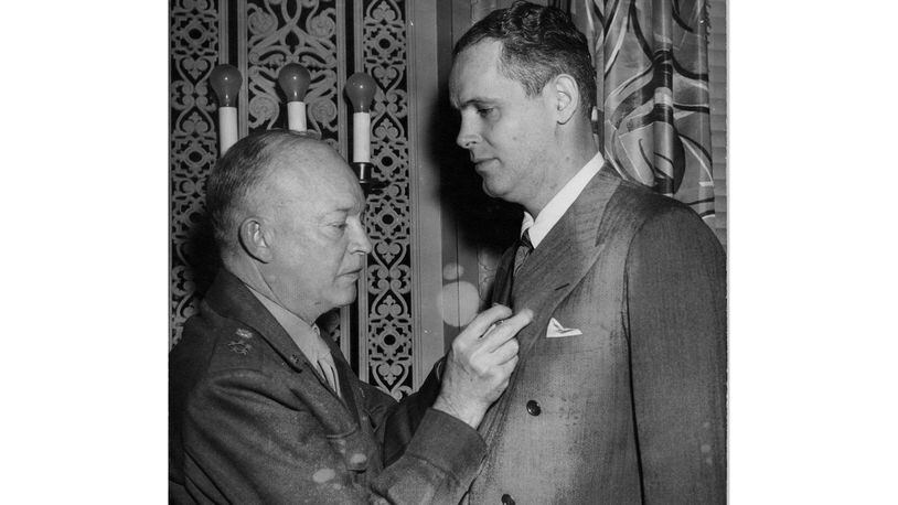 Gen. Dwight D. Eisenhower presenting the Medal of Freedom to Wright Bryan, on Nov. 20, 1947, Editor of the Atlanta Journal, for services as a war correspondent in European Theatre, 1943-45. (File photo)