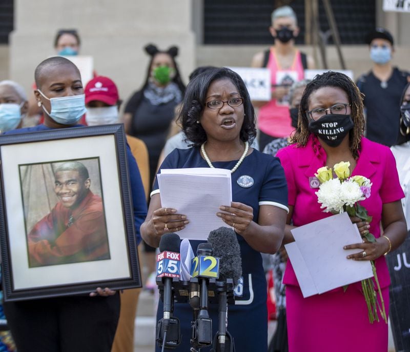 Monteria Robinson (center) speaks about her late son, Jamarion Robinson, during a press conference on the steps of the Georgia State Capitol Building in Atlanta, Tuesday, June 2, 2020. Jamarion Robinson, 26, was shot by officers more than 50 times on Aug. 5, 2016. Monteria Robinson spoke again about her son’s death during a Saturday, June 27, 2020 rally with the Atlanta NAACP. 