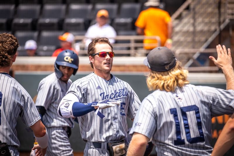 Georgia Tech center fielder Colin Hall celebrates with first baseman Andrew Jenkins after Hall's home run against Alabama State in an NCAA regional tournament game June 4, 2022 in Knoxville, Tenn. (Georgia Tech Athletics/Gage Jenkins)