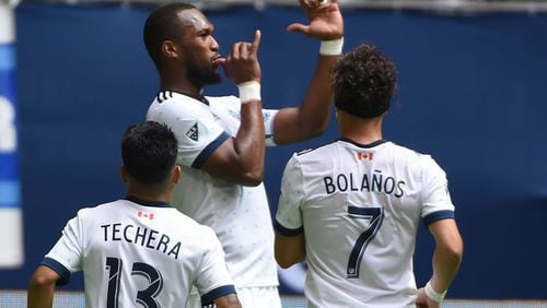 Jun 3, 2017; Vancouver, British Columbia, CAN; Vancouver Whitecaps defender Kendall Waston (4) celebrates his goal against Atlanta United goalkeeper Alec Kann (not pictured) during the first half at BC Place. Mandatory Credit: Anne-Marie Sorvin-USA TODAY Sports