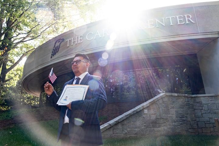 Valentin Melchor Luis, from Mexico, poses for a photo after he was sworn in as a naturalized citizen during a ceremony at The Carter Center in Atlanta on Sunday, Oct. 1, 2023. The ceremony was held at the center in honor of President Jimmy Carter’s 99th birthday.   (Ben Gray / Ben@BenGray.com)