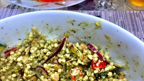 The larger grains of Israeli couscous combine with chickpeas, grilled vegetables and vibrant Green Goddess dressing come together in an excellent salad for late summer. (Kathleen Purvis/Charlotte Observer/TNS)