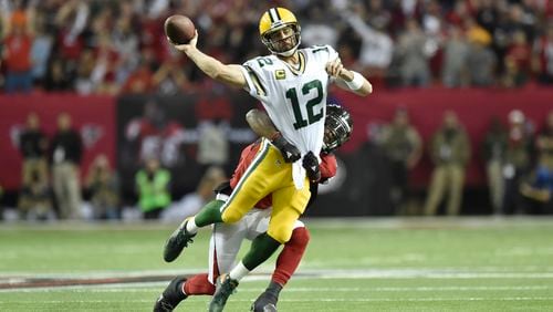 Packers quarterback Aaron Rodgers (12) is sacked during the NFC Championship game against the Packers in Atlanta, Georgia, on Sunday, January 22, 2017. (DAVID BARNES / DAVID.BARNES@AJC.COM)