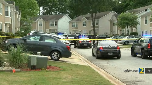 Police gathered outside a home in the 5000 block of Chupp Way Circle after a woman was shot while she was inside her residence Monday evening.