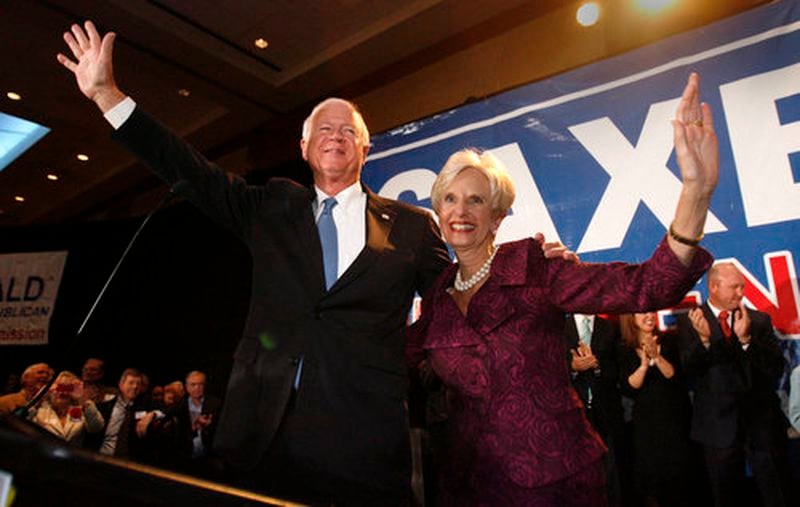 U.S. Sen. Chambliss, shown with his wife, Julianne, figured in one of Georgia's most memorable runoff elections. He trounced Jim Martin in 2008, denying Democrats a filibuster-proof majority in the Senate.