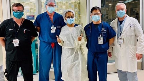 Healthcare professionals at Emory Healthcare are pictured wearing PPE. Contributed