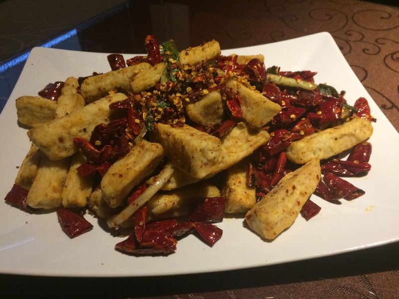 The dry-fried eggplant at Yummy Spicy is a nice introduction to Sichuan cooking. CONTRIBUTED BY WENDELL BROCK