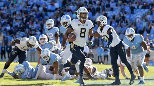 CHAPEL HILL, NC - NOVEMBER 03:  Tobias Oliver #8 of the Georgia Tech Yellow Jackets scores the go-ahead touchdown against the North Carolina Tar Heels during the fourth quarter of their game at Kenan Stadium on November 3, 2018 in Chapel Hill, North Carolina. Georgia Tech won 38-28.  (Photo by Grant Halverson/Getty Images)