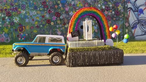 Tiny Doors ATL’s float, pulled by a tiny replica of a 1970 Ford Bronco, out for a trial spin this week. Measuring a mere 36-inches long, the float will be in Sunday’s Atlanta Pride Parade.