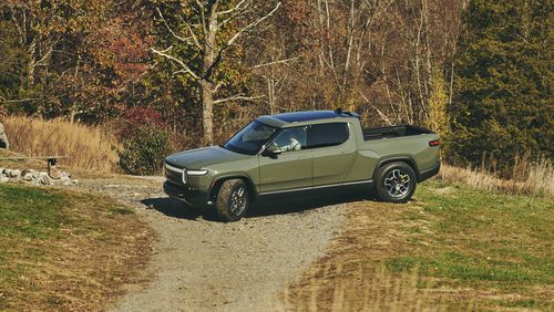 The Rivian R1T electric truck in Pound Ridge, N.Y., Nov. 9, 2021. Rivian faces fierce competition in the market for electric trucks, but analysts rave about its vehicles and financial backing. (Bryan Derballa/The New York Times)