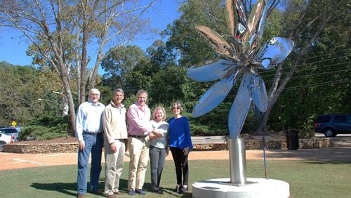 “Sentience” takes its place as a permanent public art work in Roswell:(from left) Lawrence Catchpole of the Roswell Arts Fund; Dave Schmit and Randy Schultz of the Roswell Downtown Development Authority; and Marie Willsey and Rochelle Mucha of the Arts Fund. ROSWELL ARTS FUND