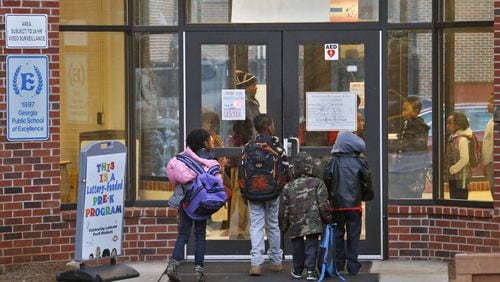 Whitefoord Elementary School students arrive to the start of school. The Altanta Board of Education voted March 6 to close Whitefoord and Adamsville elementary schools next year.
