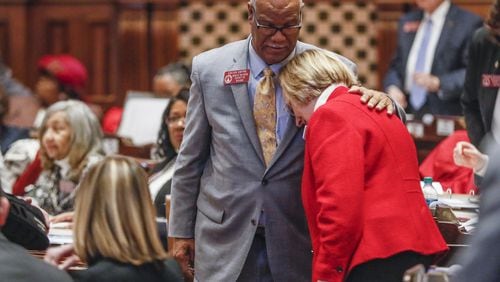 State Rep. Sharon Cooper (R-Marietta) is congratulated by Rep. Calvin Smyre, (D-Columbus), after the passage of a bill on reform of senior care in Georgia. Smyre spoke in support of the bill. The Georgia house passed HB 987, sponsored by Cooper, to provide additional measures for the protection of elderly persons and better regulate assisted living facilities and large personal care homes. Bob Andres / robert.andres@ajc.com